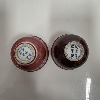 Lot 60 - A pair of Chinese Sang Du Beouf porcelain tea bowls