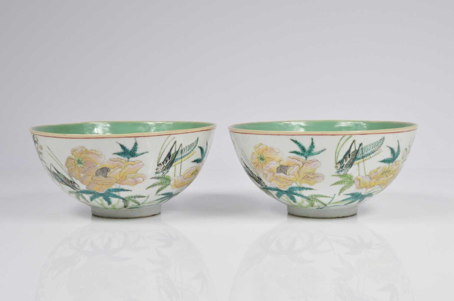 Lot 65 - A pair of late Ching Dynasty Chinese porcelain grasshopper bowls
