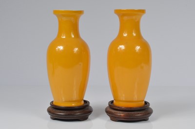 Lot 69 - A pair of modern Chinese porcelain vases and another vase