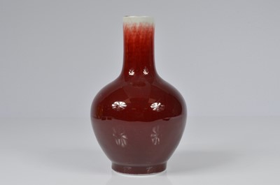 Lot 69 - A pair of modern Chinese porcelain vases and another vase