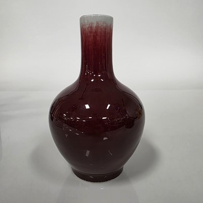 Lot 69 - A pair of modern Chinese porcelain vases and another vase