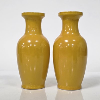 Lot 69 - A pair of modern Chinese porcelain vases and another vase
