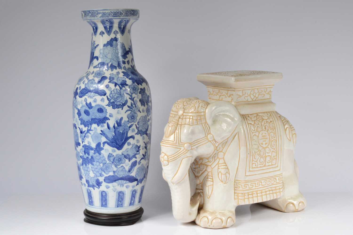 Lot 70 - A large modern Chinese blue and white porcelain vase and a pottery elephant seat