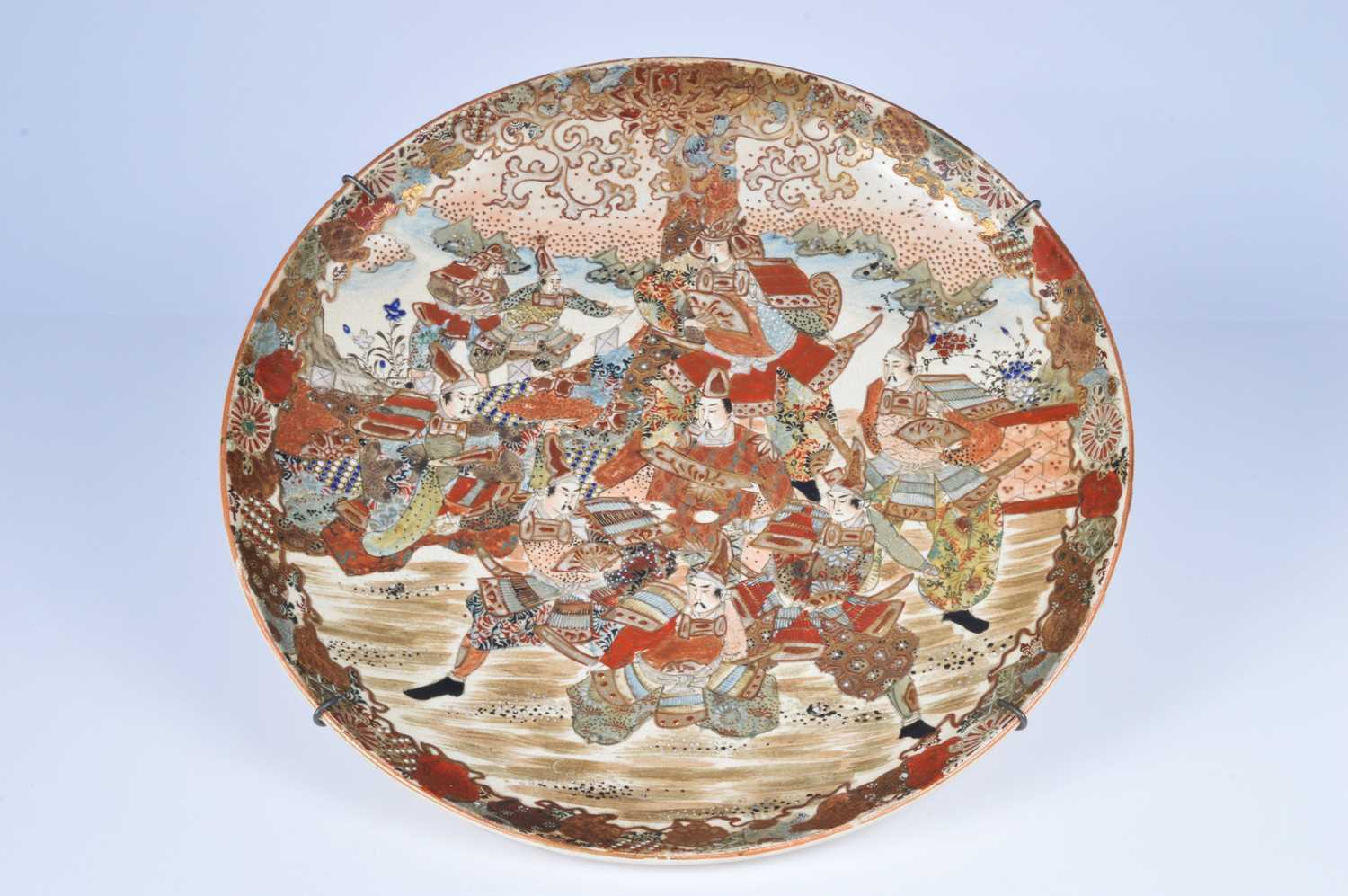 Lot 83 - A large early 20th century Japanese Satsuma style earthenware charger