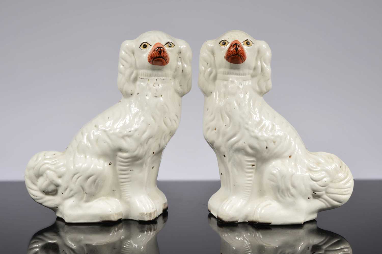 Lot 91 - A pair of Victorian Staffordshire pottery spaniels