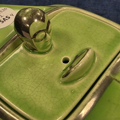 Lot 92 - Four Art Deco period Sadler Pottery racing car teapots