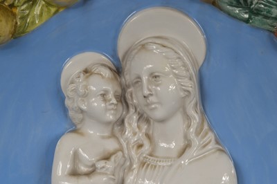 Lot 96 - A mid-20th century Italian pottery plaque of a Madonna and Child