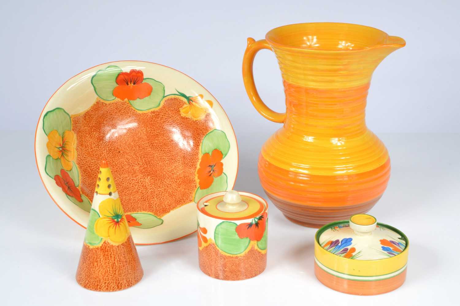 Lot 163 - Four Art Deco period Clarice Cliff Bizarre pottery items and a Shelley Pottery jug
