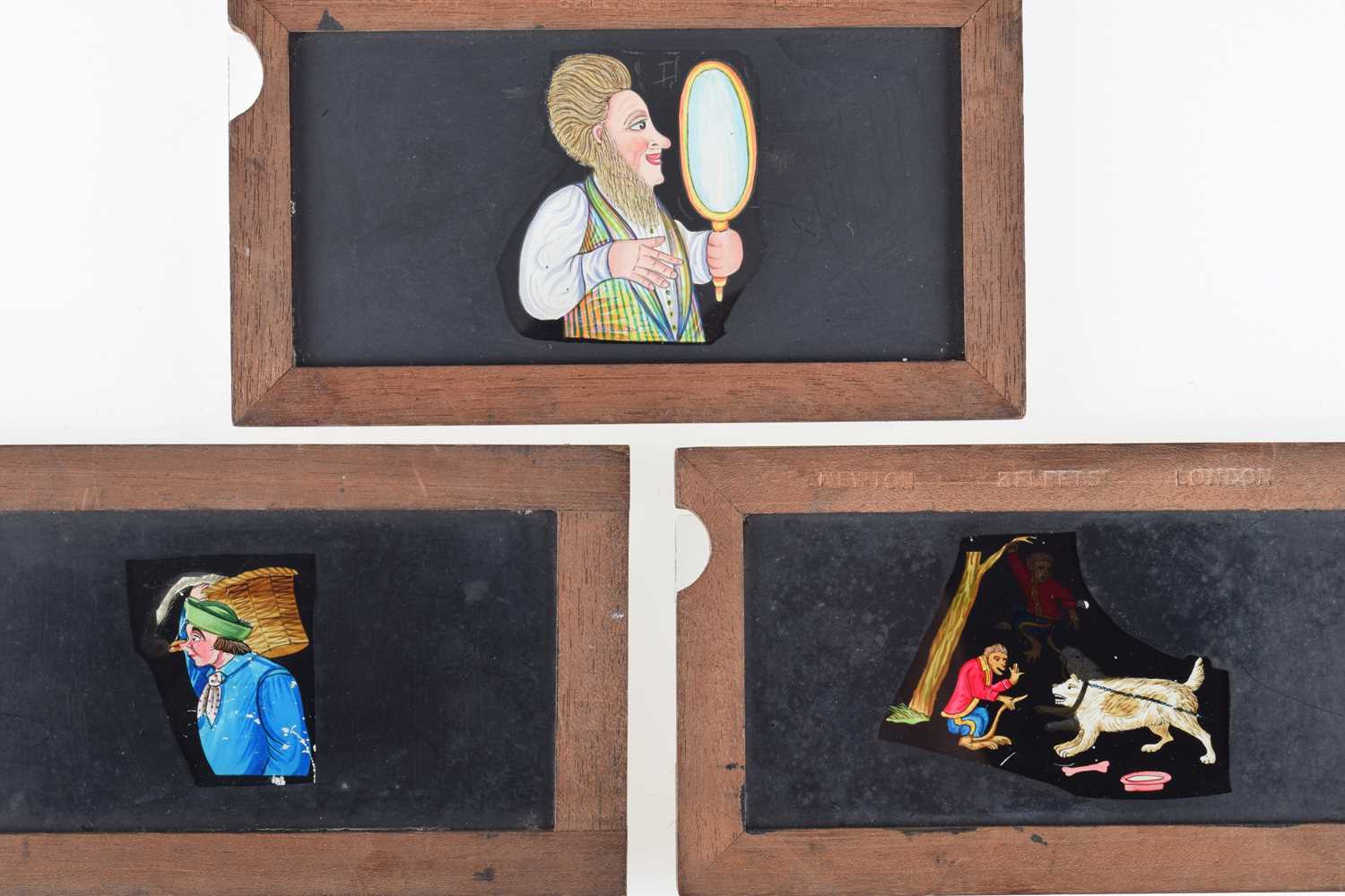Lot 25 - Thirty Four Mahogany Mounted Slipping Magic Lantern Slides