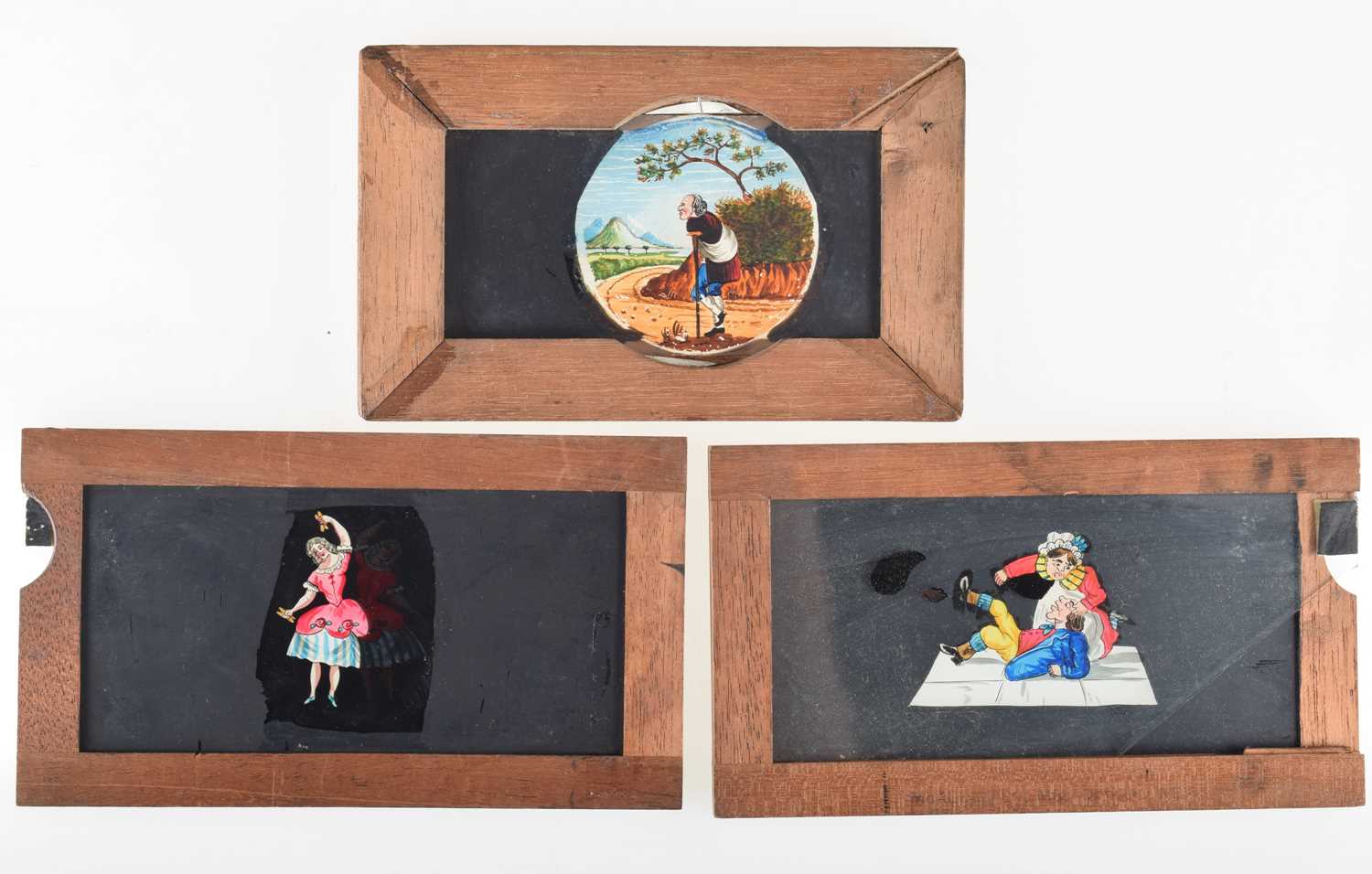 Lot 31 - Thirty Mechanical Mahogany Mounted Magic Lantern Slides