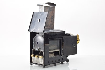 Lot 59 - A Black Tinplate and Brass Magic Lantern